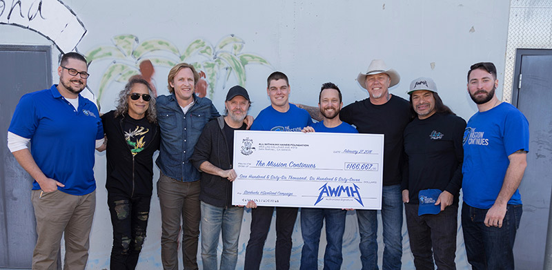 Metallica presents a check from their charitable foundation, All Within My Hands to The Mission Continues